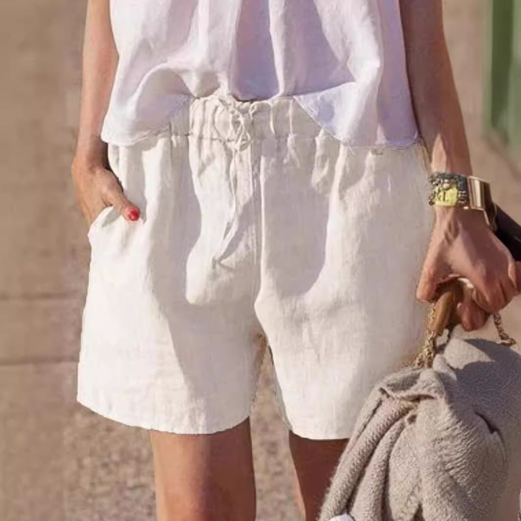 Pantalones casuales holgados de algodón y lino de color liso con cintura elástica y cordón para atar.