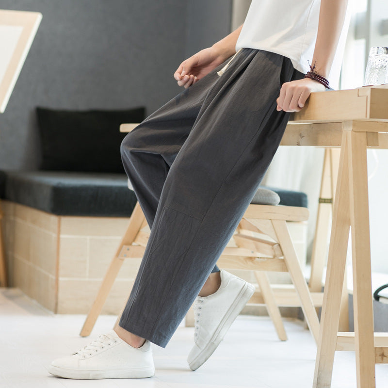 Pantalones casuales de corte recto y holgados de algodón y lino para hombre