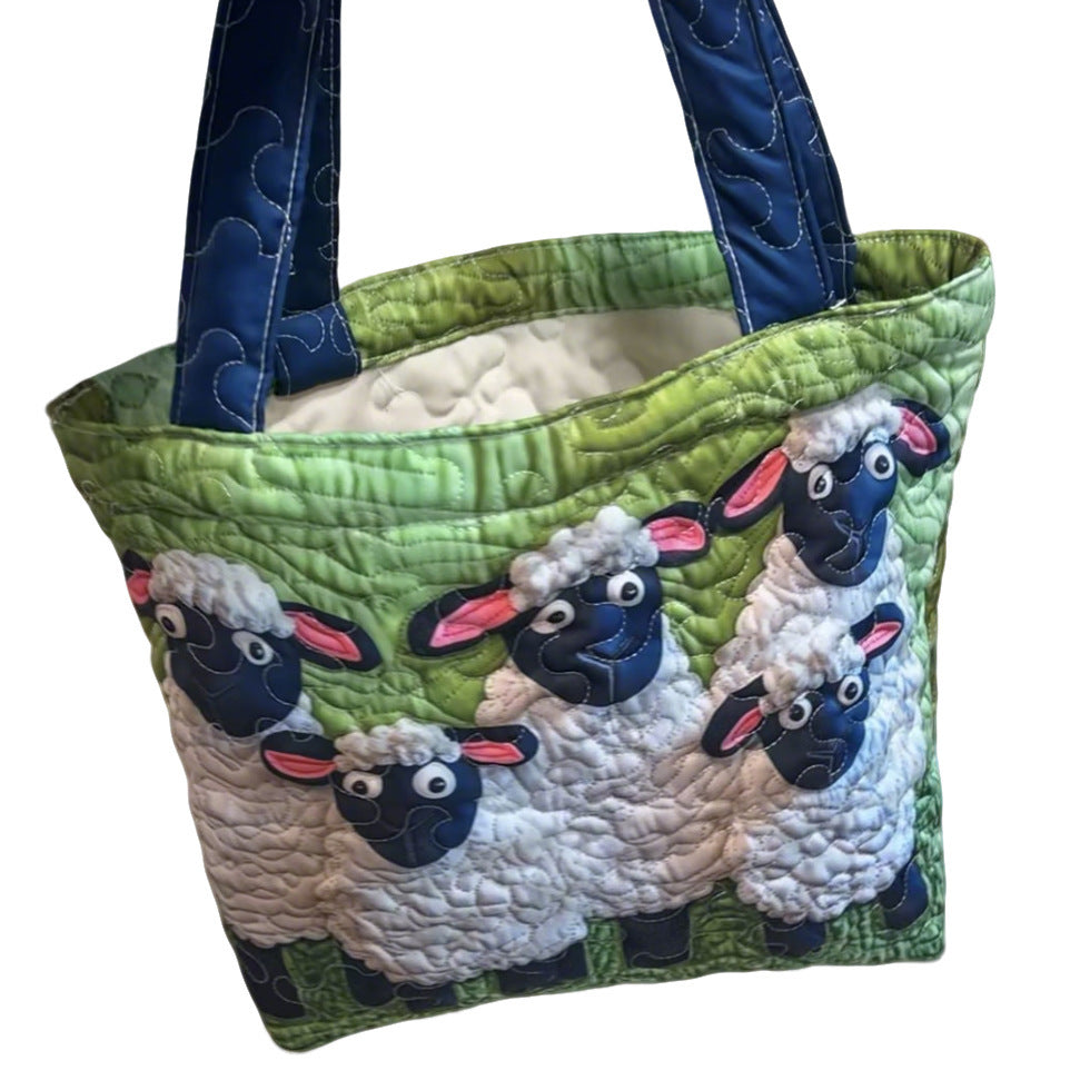 Bolso tote creativo de gran capacidad con impresión digital y bordado acolchado.