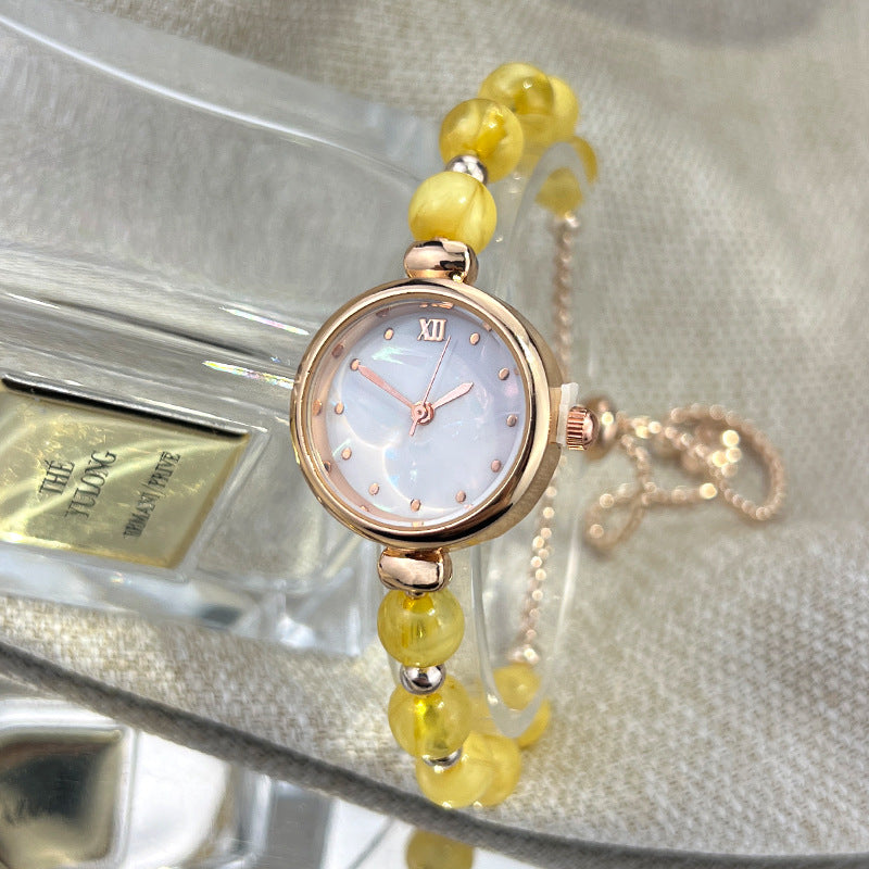 Reloj de cuarzo para mujer con pulsera de perlas, diseño lujoso y ligero, esfera pequeña y correa ajustable extraíble.