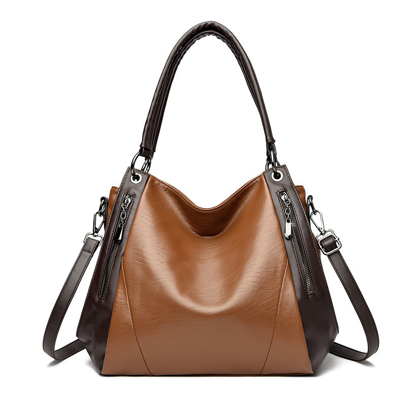 Un bolso tote de cuero suave, sencillo y versátil