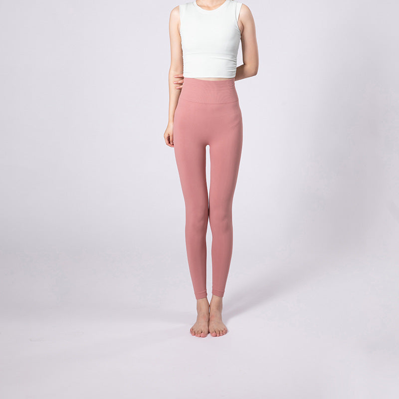 Pantalones de yoga de cintura alta con control de abdomen y levantamiento de glúteos en colores lisos