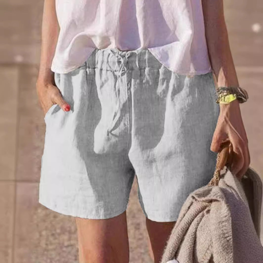 Pantalones casuales holgados de algodón y lino de color liso con cintura elástica y cordón para atar.